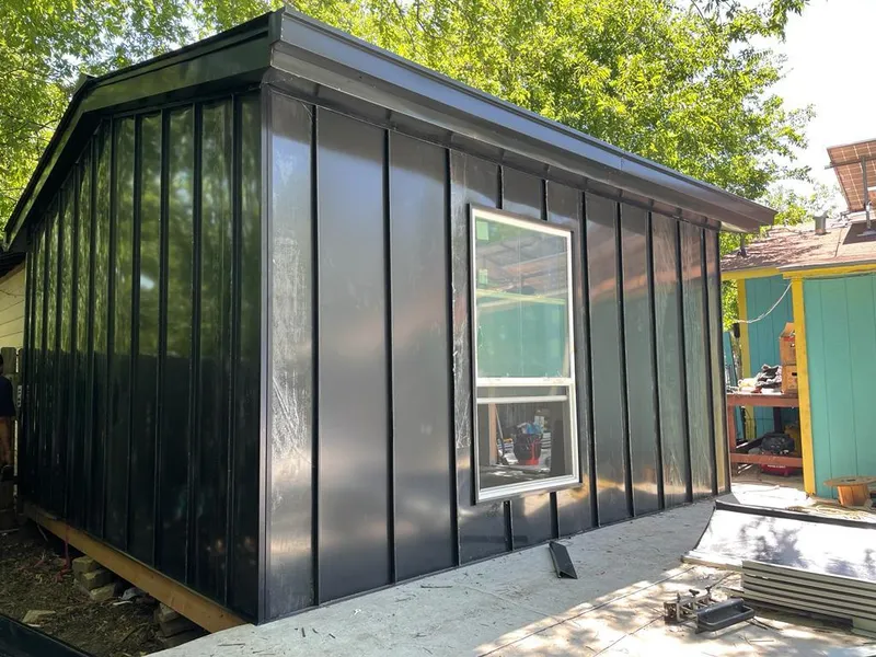 Black standing seam metal wall panels for Roof Inspection in Fullerton